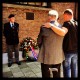 Vader en zoon Görtemöller bij de zojuist gelegde krans voor de Merwedegijzelaars in het algemeen en hun vader en grootvader in het bijzonder, 16 mei 2014